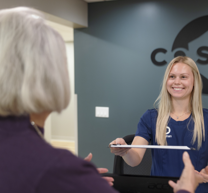 Oral surgery patient getting her teeth and jaws scanned