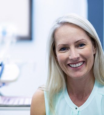 Female dental patient smiling